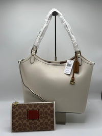 Coach Hive Cross Body Bags