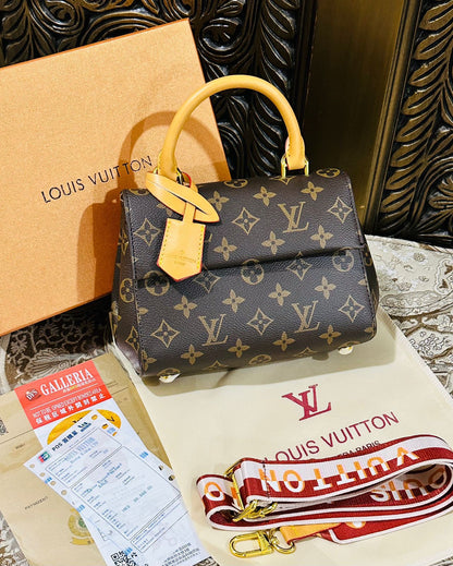 Louis Vuitton Cluny Handbag