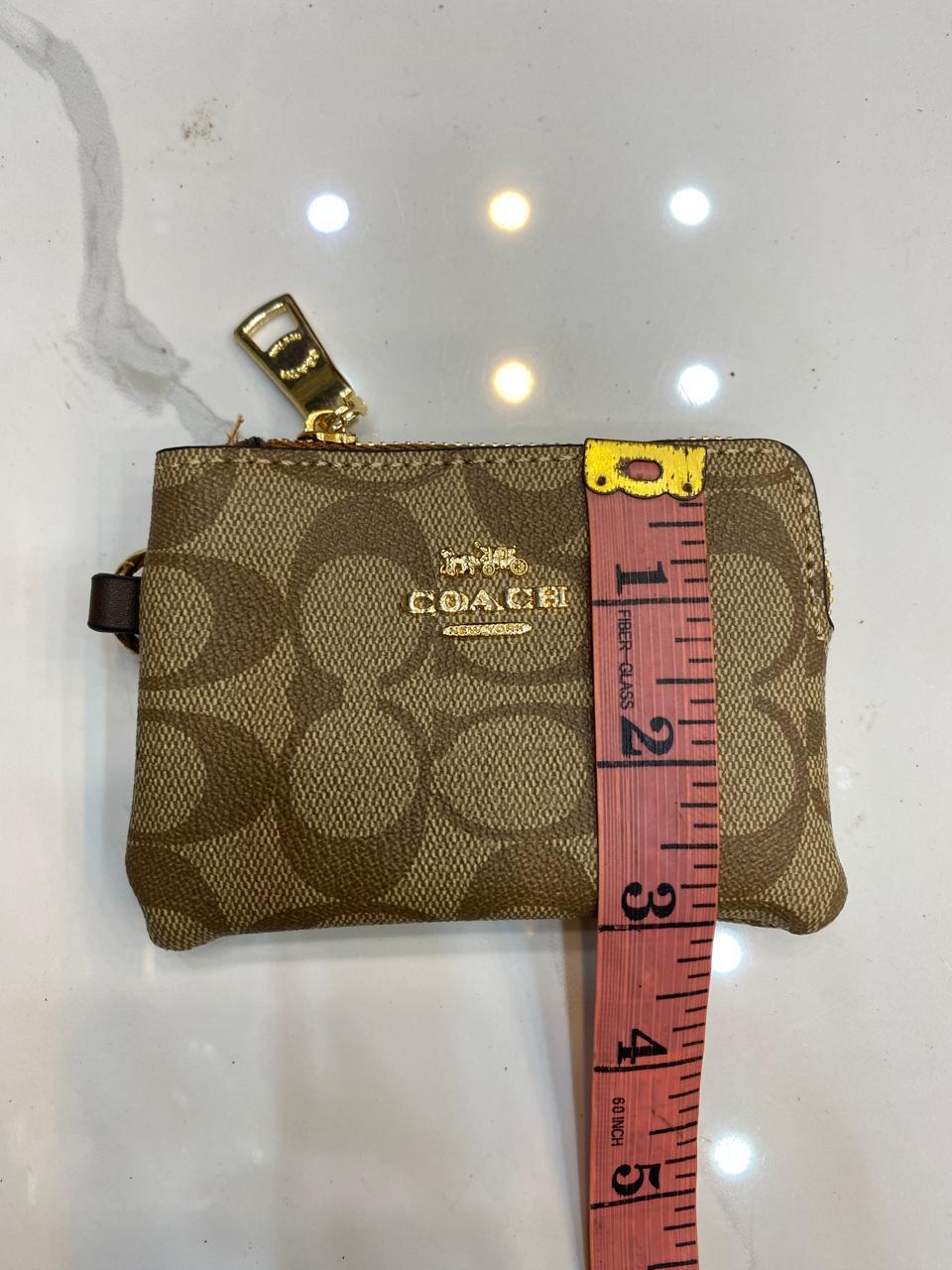 Coach Signature Canvas Corner Zip Wristlet