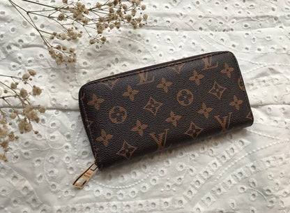 Louis Vuitton Leather Crafted Zipper Wallet