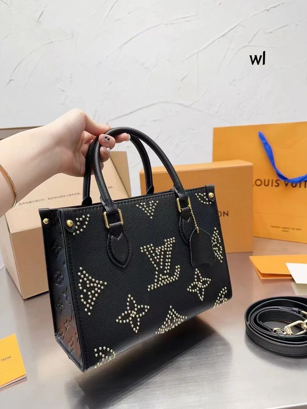 Louis Vuitton On the Go Black Studded Tote