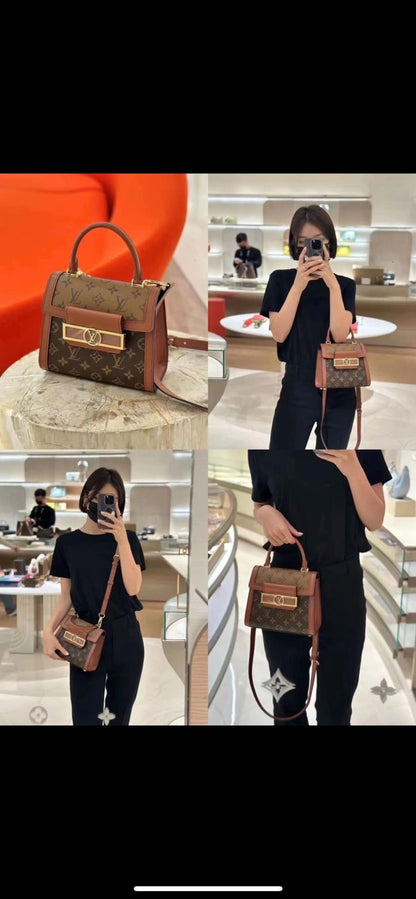 Louis Vuitton Reisse Handbag