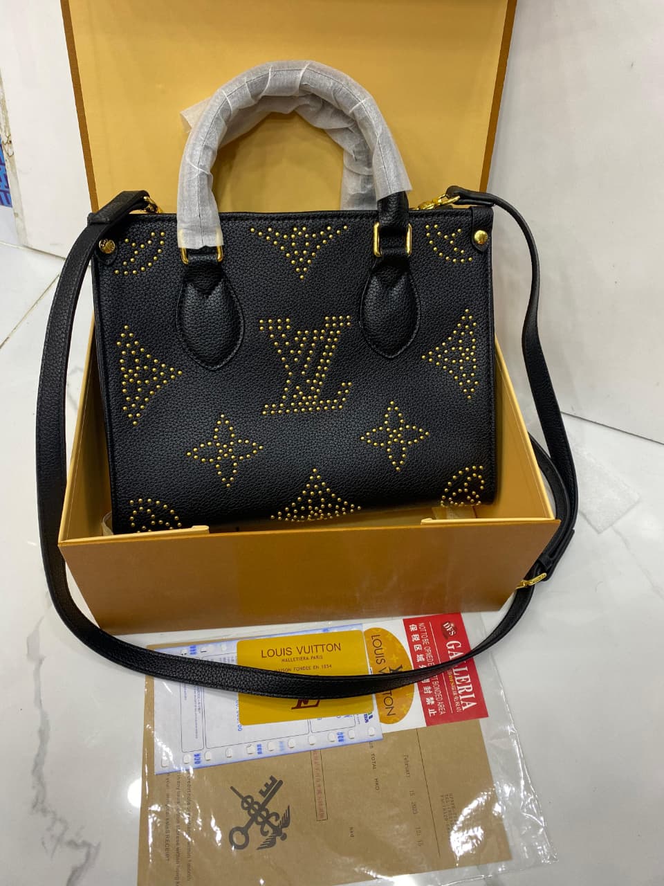 Lv On The Go Monogram Empreinte Bag