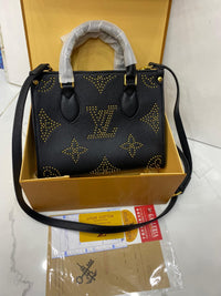 Lv On The Go Monogram Empreinte Bag