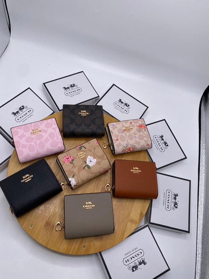 Coach Mini Wallets