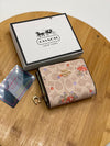 Coach Mini Wallets