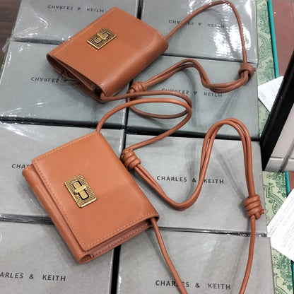 Charles and Keith Edna Turn-Lock Knotted-Strap Wallet