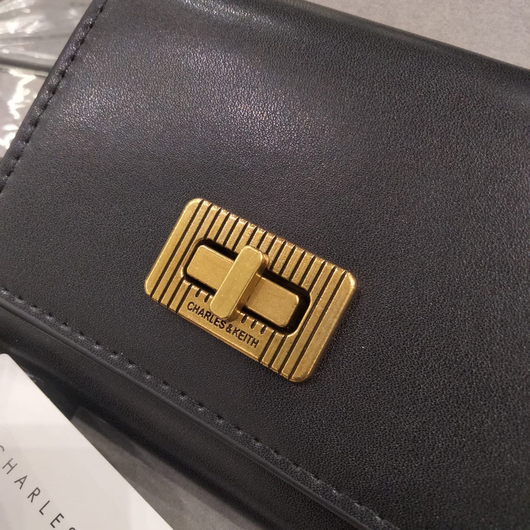 Charles and Keith Edna Turn-Lock Knotted-Strap Wallet